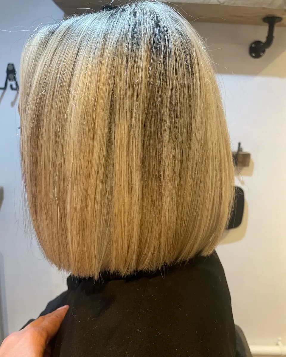 Smooth, glossy blonde finished at the AVM Hair studio
