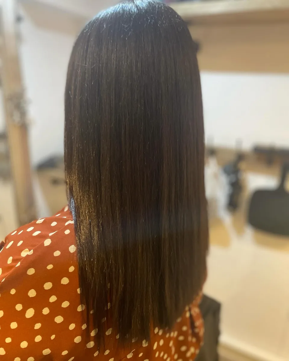 Rich warm brunette on long hair, glossy from root to tip
